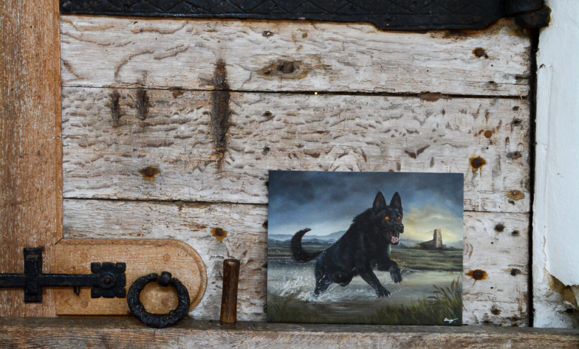 An image of my Black Shuck oil painting upon the door at the Holy Trinity Church at Blythburgh where his claw marks still can be seen